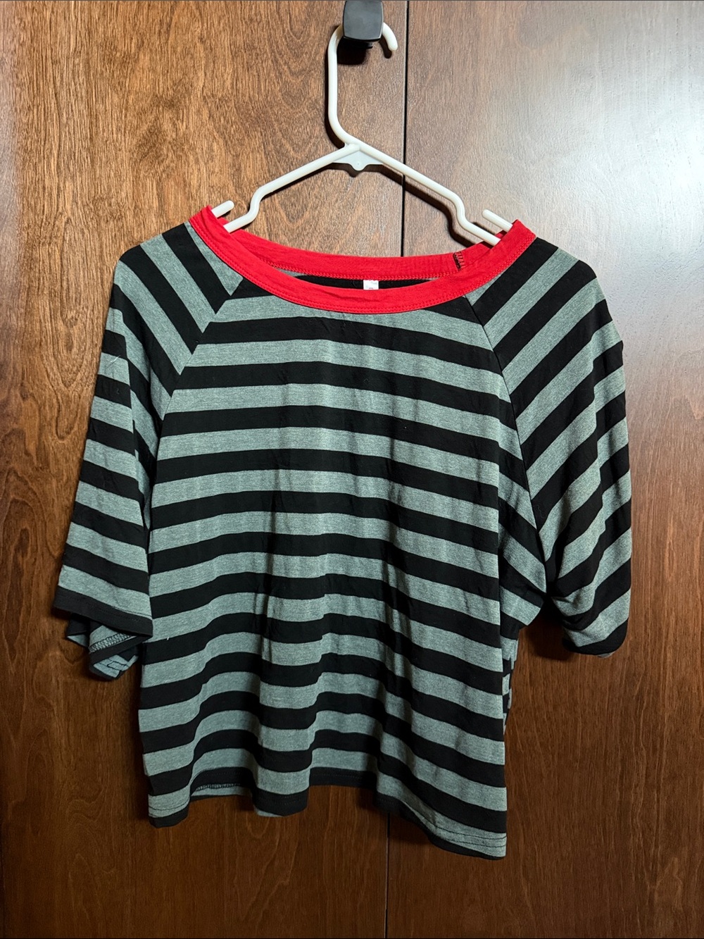 Women’s semi cropped black and grey striped shirt with red neckline
